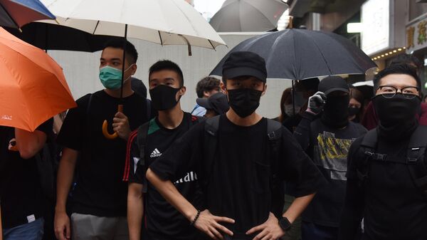Участники акции протеста в Гонконге.  17 августа 2019  