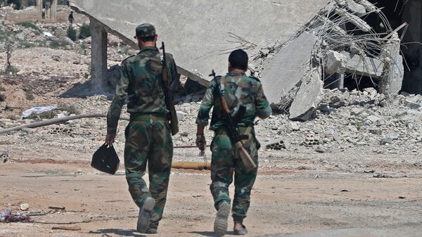 Сирийские правительственные войска в городе Хан-Шейхун в провинции Идлиб