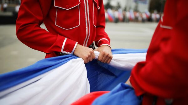 Почётный караул Кубанского казачьего войска на празднование Дня государственного флага Российской Федерации в Краснодаре