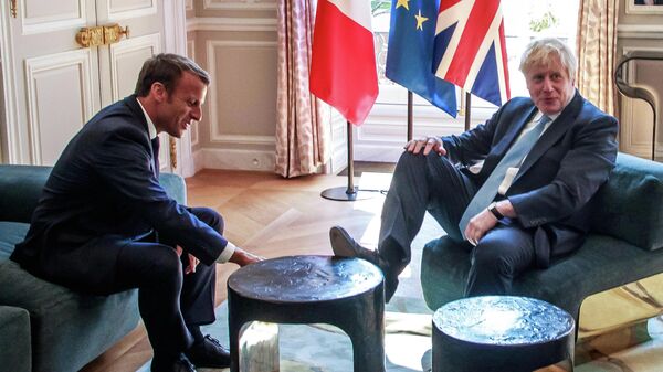 Премьер-министр Великобритании Борис Джонсон во время встречи с президентом Франции Эммануэлем Макроном во дворце Елисейского дворца в Париже. 22 августа 2019