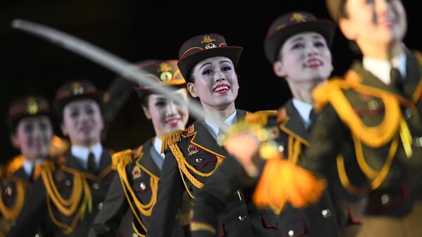 Военный оркестр Народной армии Корейской Народно-Демократической Республики выступает на торжественной церемонии открытия XII Международного военно-музыкального фестиваля Спасская башня на Красной площади в Москве