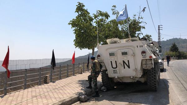 Военнослужащий временных сил ООН в южном Ливане (UNIFIL) на наблюдательном посту в деревне Адейси на ливано-израильской границе