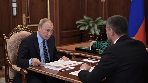  Владимир Путин и временно исполняющий обязанности губернатора Забайкальского края Александр Осипов  во время встречи. 29 августа 2019