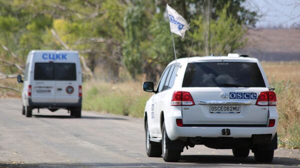 Представители миссии ОБСЕ и СЦКК попали под обстрел силовиков в селе Коминтерново на юге ДНР. 1 сентября 2019