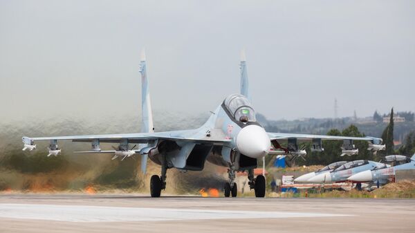 Истребители Су-27 ВКС России на авиабазе Хмеймим в Сирии