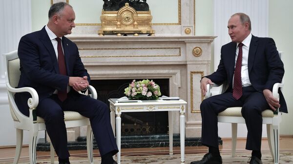 Президент РФ Владимир Путин и президент Молдавии Игорь Додон во время встречи 