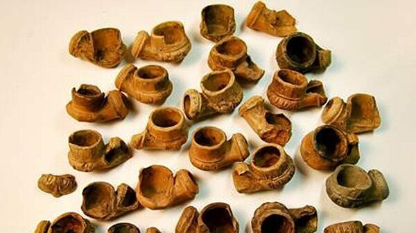 Фрагменты старинных курительных трубок, найденных в Москве