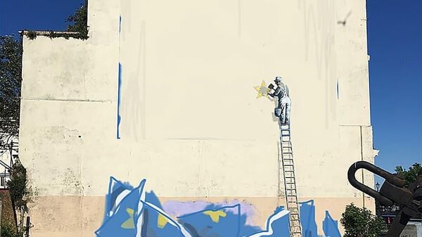 Граффити британского стрит-арт художника Бэнкси