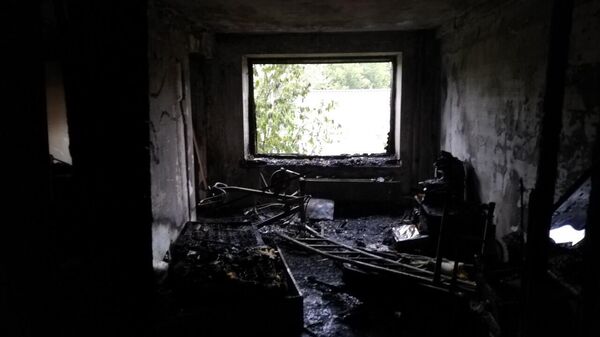 Сгоревшая квартира в доме на улице Гусарова в Красноярске