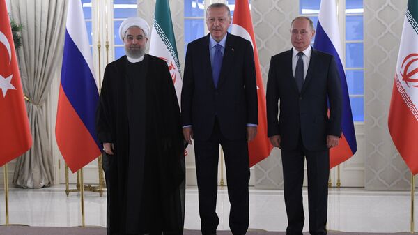 Президент РФ Владимир Путин, президент Турции Реджеп Тайип Эрдоган и президент Ирана Хасан Рухани. 16 сентября 2019