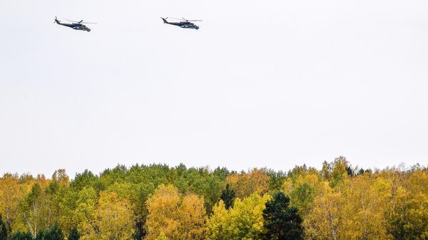 Вертолеты Ми-24 во время стратегических командно-штабных учений Центр-2019 в Кемеровской  области  