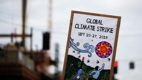 Плакат во время климатической забастовки в Сиэтле. 20 сентября 2019