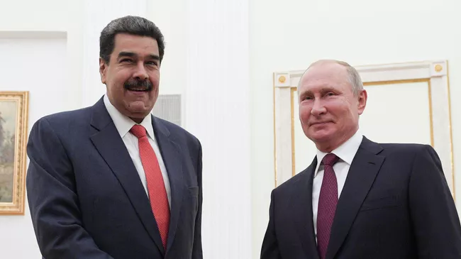 Президент РФ Владимир Путин и президент Венесуэлы Николас Мадуро во время встречи