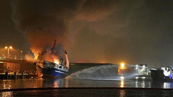 Тушение российского траулера Бухта Наездник в порту Тромсё, Норвегия