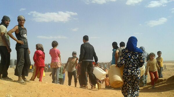 Сирийские беженцы в лагере Рукбан