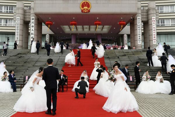 Массовая свадьба в Цзясине, провинция Чжэцзян, Китай