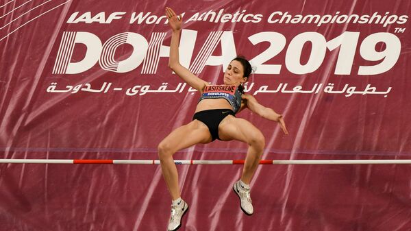 Мария Ласицкене (Россия) на чемпионате мира по легкой атлетике в Дохе