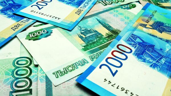 Банкноты номиналом 1000 и 2000 рублей