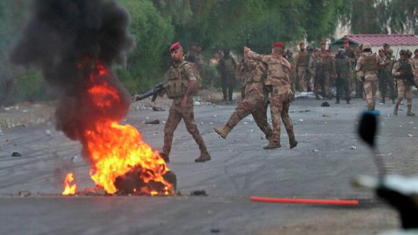 Иракские военные во время антиправительственной акции протеста в Багдаде