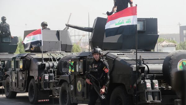 Бойцы спецподразделения по борьбе с терроризмом и военнослужащие на улице Багдада