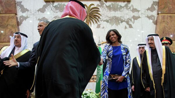 Первая леди США Мишель Обама и король Саудовской Аравии Салман ибн Абдул-Азиз Аль Сауд в Эр-Рияде. 27 января 2015 
