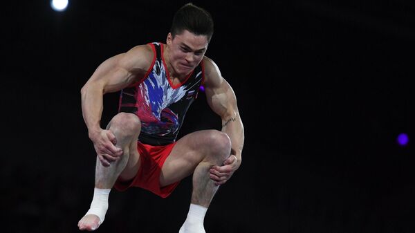 Никита Нагорный (Россия) выполняет опорный прыжок в финале соревнований на чемпионате мира по спортивной гимнастике в Штутгарте.