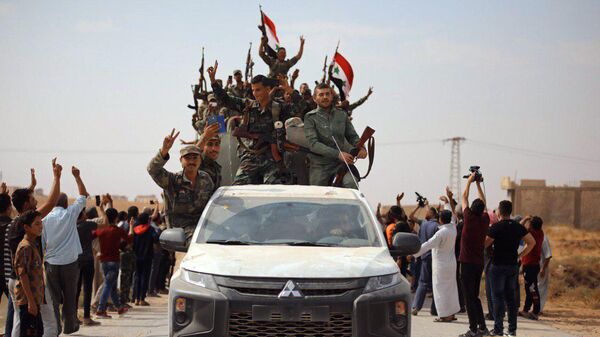 Сирийская армия в городе Айн-Исса на севере провинции Ракка
