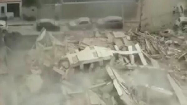Стоп-кадр видео обрушения здания в городе Форталеза в Бразилии