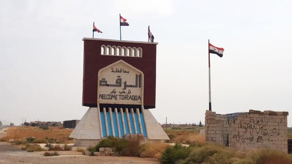 Сирийские флаги над Раккой. 16 октября 2019