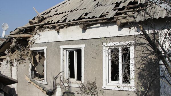 Последствия обстрела в поселке Старомихайловка со стороны ВСУ