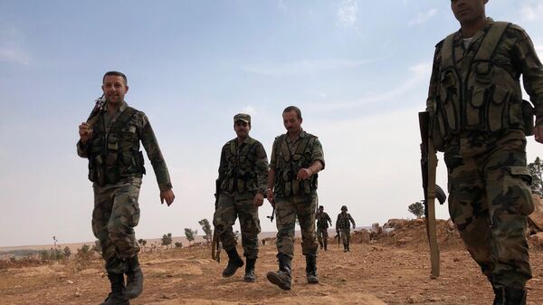 Сирийские военные на линии обороны на северо-западе района Манбидж