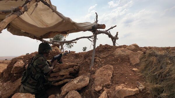 Сирийские военные на линии обороны на северо-западе района Манбидж