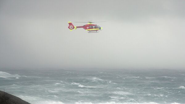 Вертолет спасательной службы Норвегии во время шторма