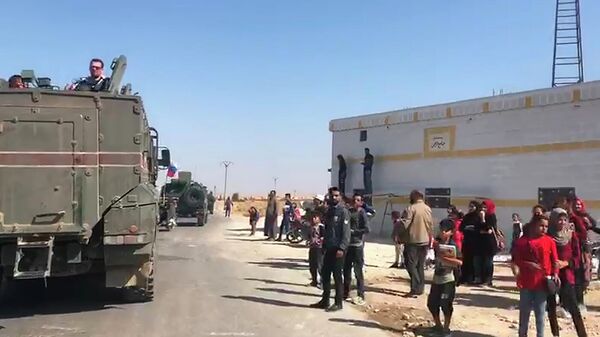 Колонна военной полиции РФ пересекла Евфрат и движется к пограничному сирийскому городу Кобани