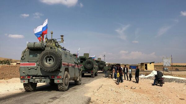 Бронеавтомобили военной полиции РФ в районе Кобани на сирийско-турецкой границе