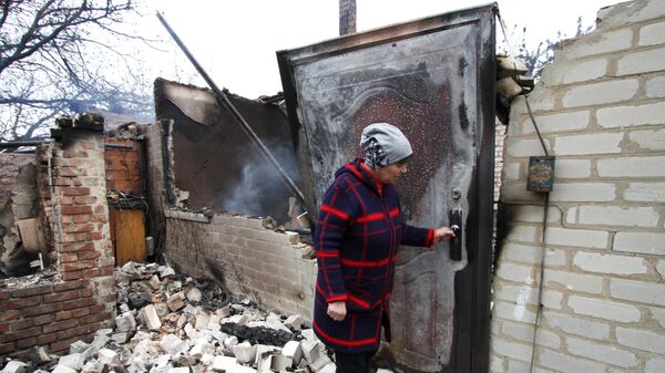 Дом на окраине Петровского района Донецка, сгоревший от прямого попадания снаряда в ходе обстрела