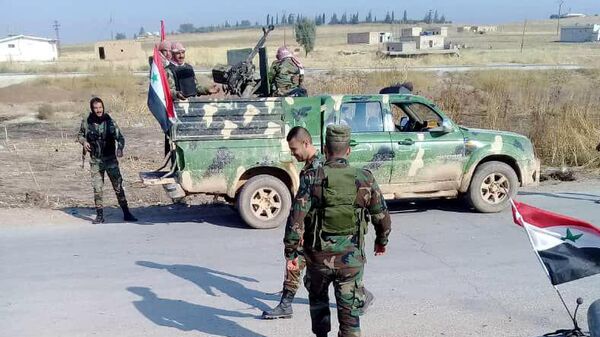 Сирийские военные около города Рас эль-Айн. 27 октября 2019