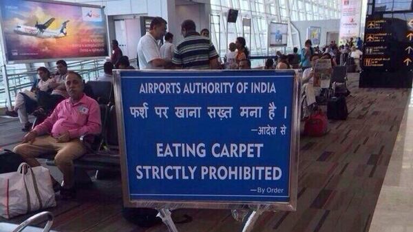 Предупредительная надпись в аэропорту города Ченнаи, Индия