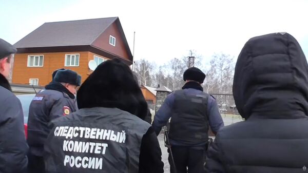 Следственные действия по делу об убийстве бывшего главы Киселевска. Стоп-кадр видео СК