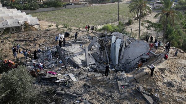 Дом, разрушенный в результате израильского авиаудара в южной части сектора Газа