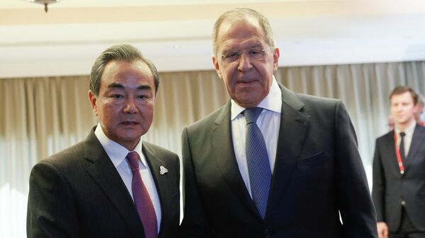 Министр иностранных дел Китая Ван И и министр иностранных дел РФ Сергей Лавров