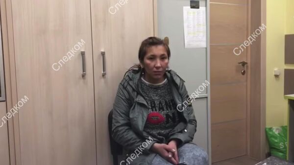 Задержанная по подозрению в оставлении новорожденного ребенка в опасности. Стоп-кадр видео СК РФ