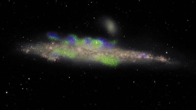 Составное изображение спиральной галактики NGC 4631. Розовым цветом показан звездный диск; зеленым – линии магнитного поля, направленные на нас; синим – от нас