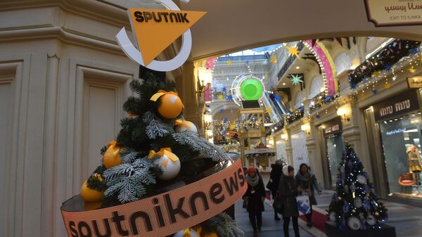 Цифровая елка международного информационного агентства и радио Sputnik в ГУМе