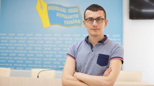 Украинский журналист Сергей Томиленко