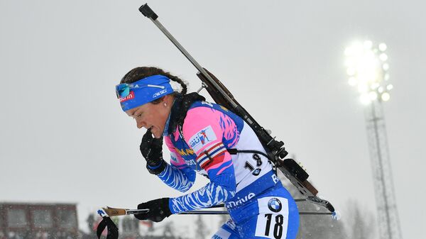 Екатерина Юрлова-Перхт (Россия) на дистанции масс-старта среди женщин на чемпионате мира по биатлону в шведском Эстерсунде.
