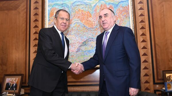 Министр иностранных дел РФ Сергей Лавров и министр иностранных дел Азербайджана Эльмар Мамедъяров во время встречи