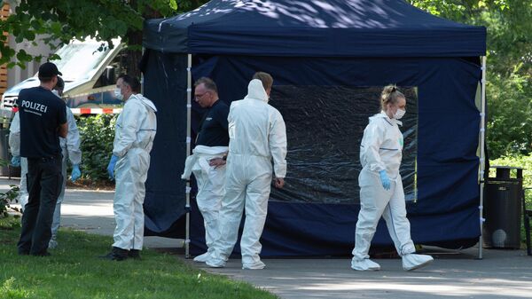 Cудебно-медицинские эксперты на месте убийства в берлинском районе Моабит
