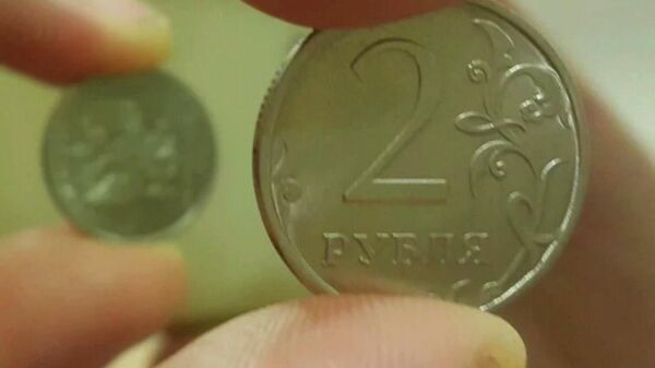 Монета номиналом в два рубля 2016 года, выставленная на продажу на портале бесплатных объявлений Авито 