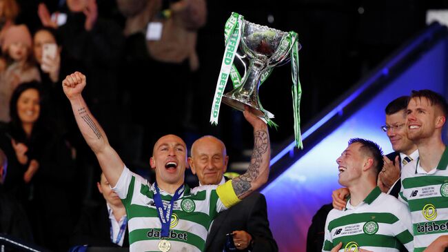 Soccer Football - Scottish League Cup Final - Celtic v Rangers - Hampden Park, Glasgow, Scotland, Britain - December 8, 2019  Celtic's Scott Brown celebrates winning the Scottish League Cup Final  Action Images via Reuters/Jason Cairnduff